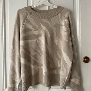 Athleta L cream and white tiger sweater